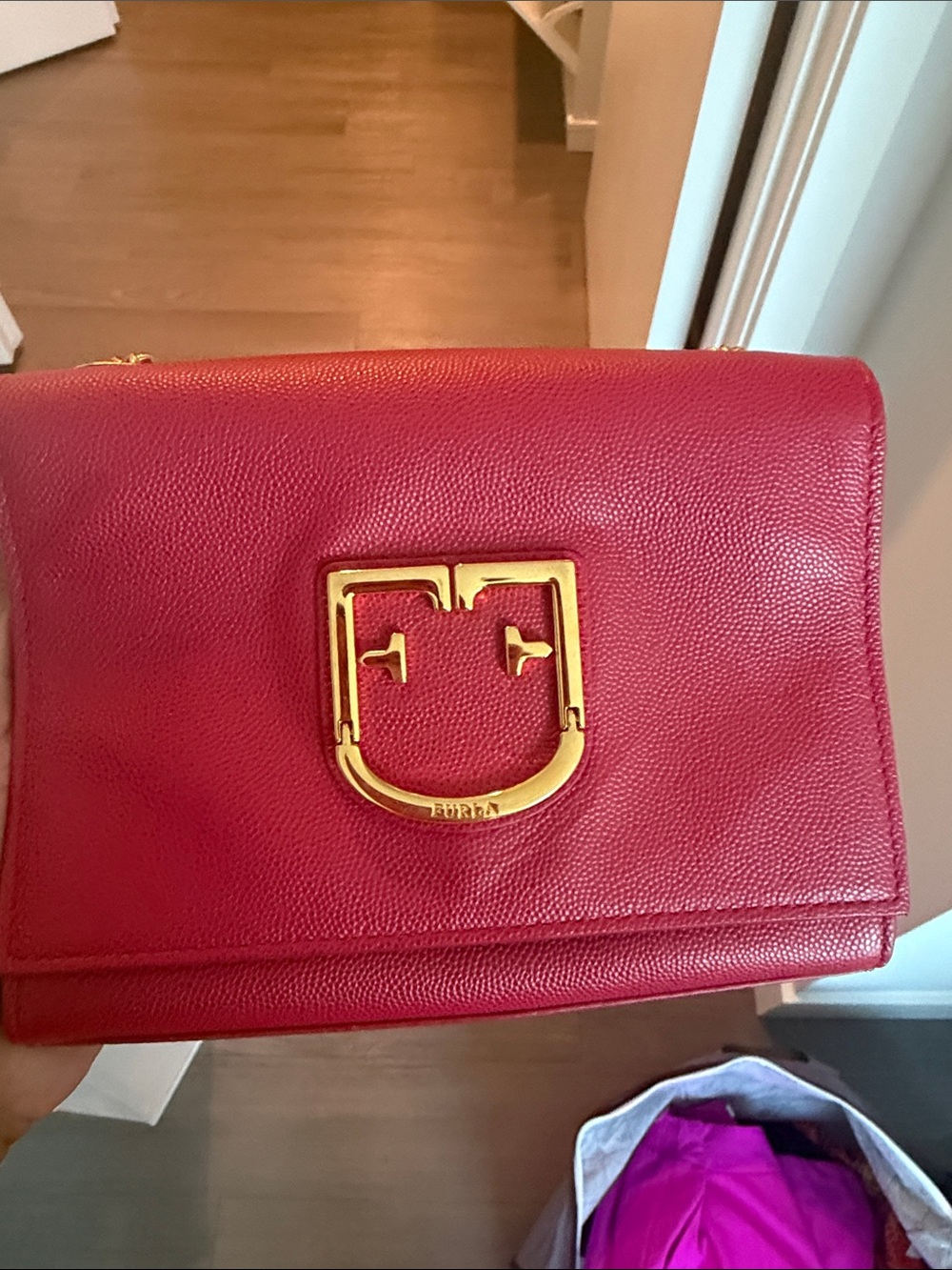 Furla red crossbody with Gold Emblem